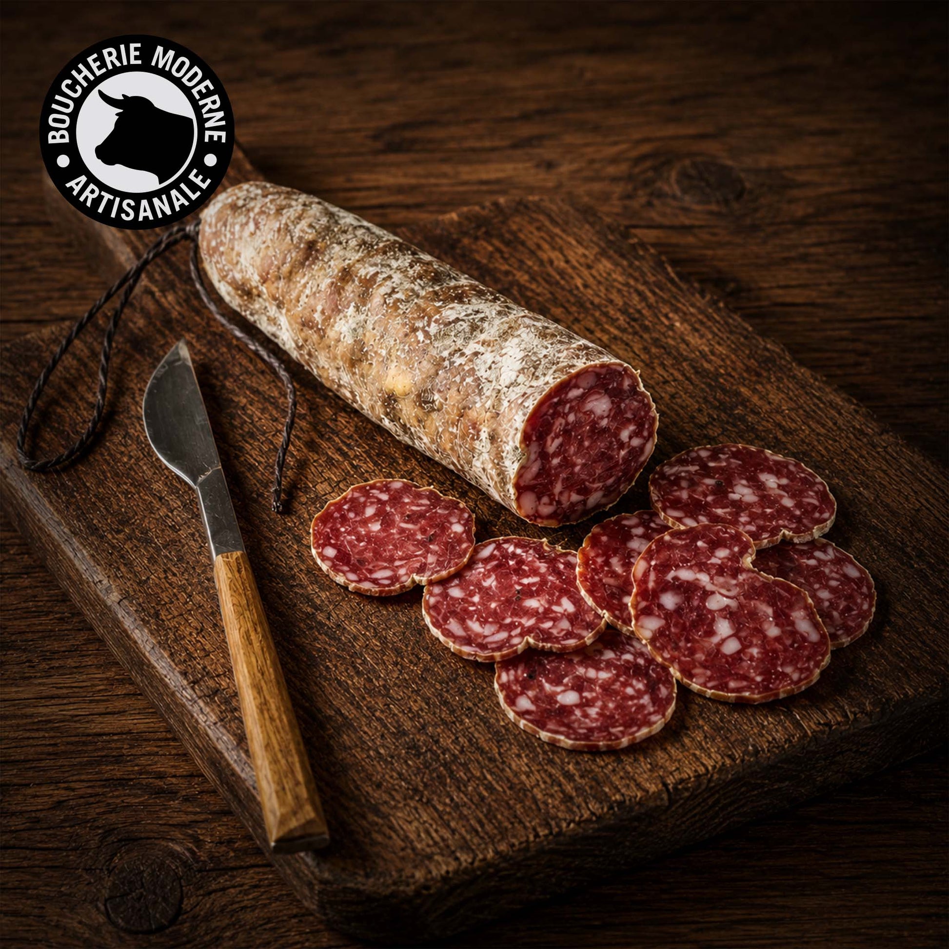 Saucisson pur Noir de Bigorre, affiné lentement, à la saveur unique et fondante.