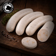 Boudin blanc au foie gras, fondant et raffiné, idéal pour les repas de fête.