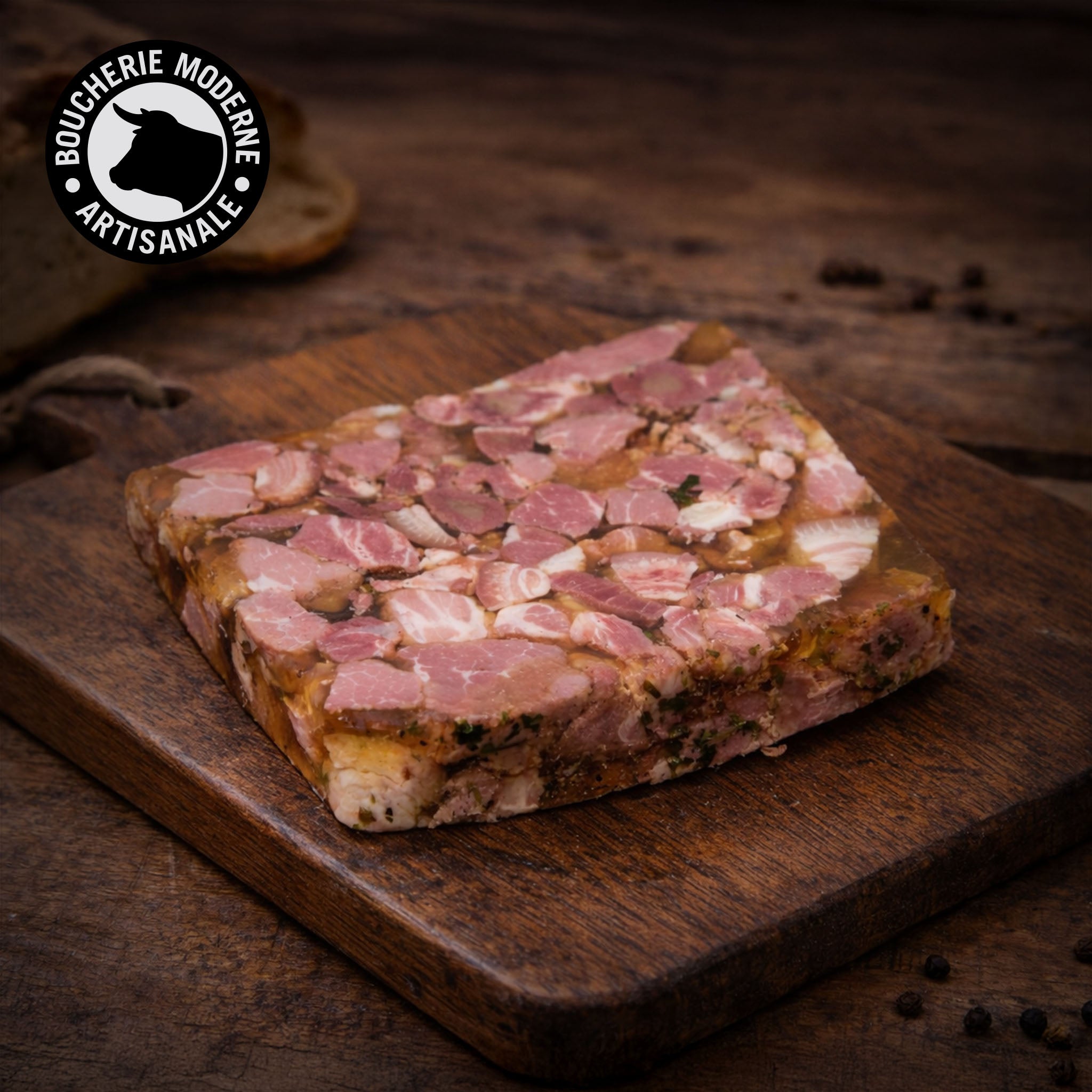 Pâté de tête traditionnel, fondant et parfumé, préparé à l’ancienne.