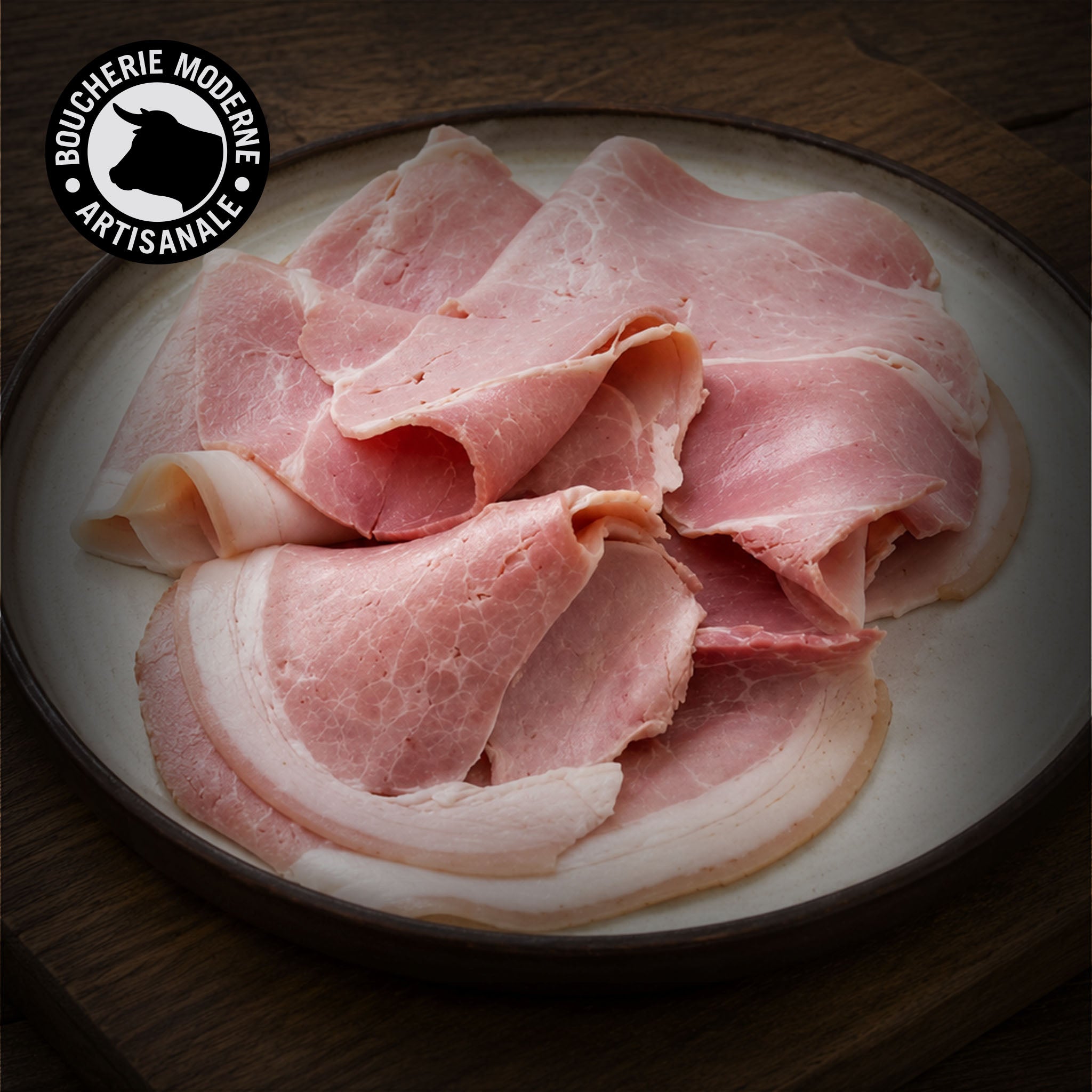 Jambon à l’ancienne Madame Mauriac, salé à sec et affiné lentement, au goût authentique.