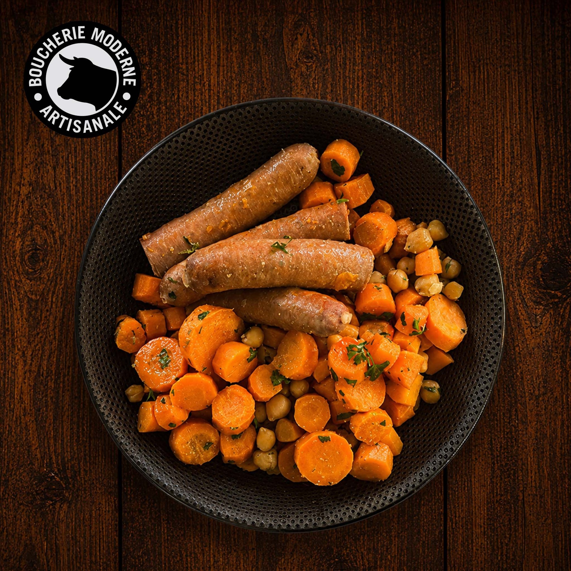 Merguez aux carottes et pois chiches, plat complet aux saveurs orientales.