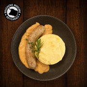 Saucisse purée maison sauce au poivre, un plat réconfortant et généreux, préparé comme à la maison.