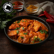 Morceaux de poulet marinés façon tikka, savoureux.